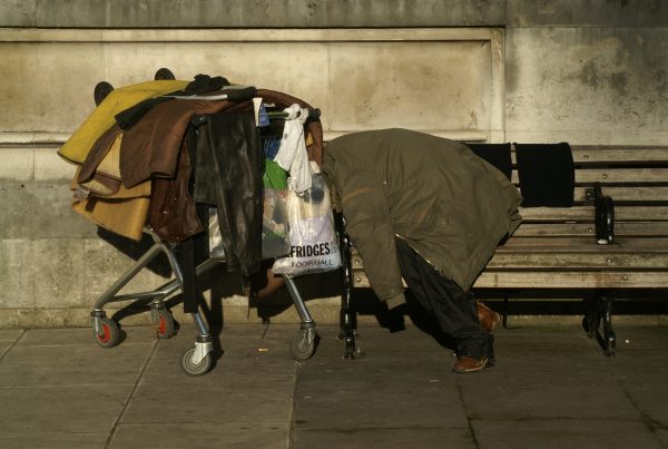 Homeless man, shopping trolley, selfridges bag